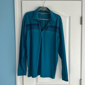 Men’s XL Under Armour long sleeve golf polo. Excellent condition. Color: teal.